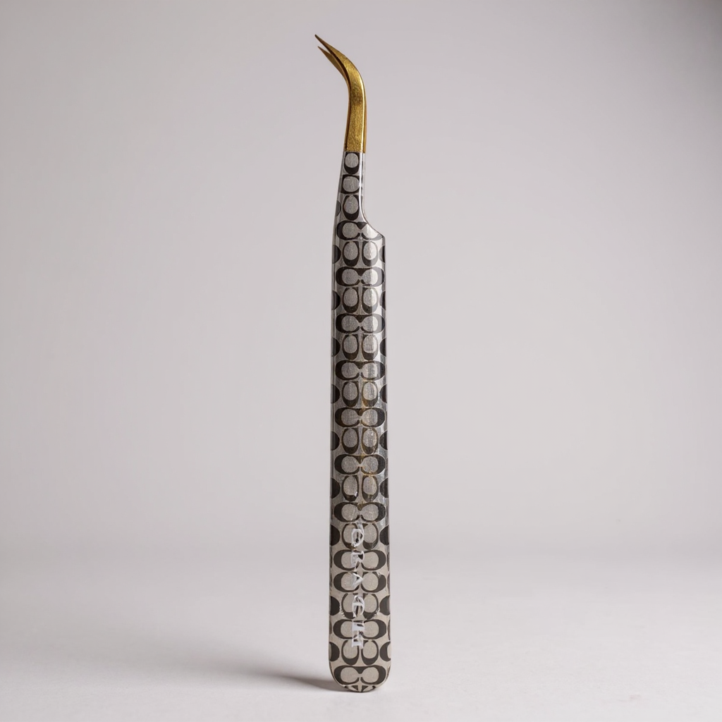 Coach Tweezers