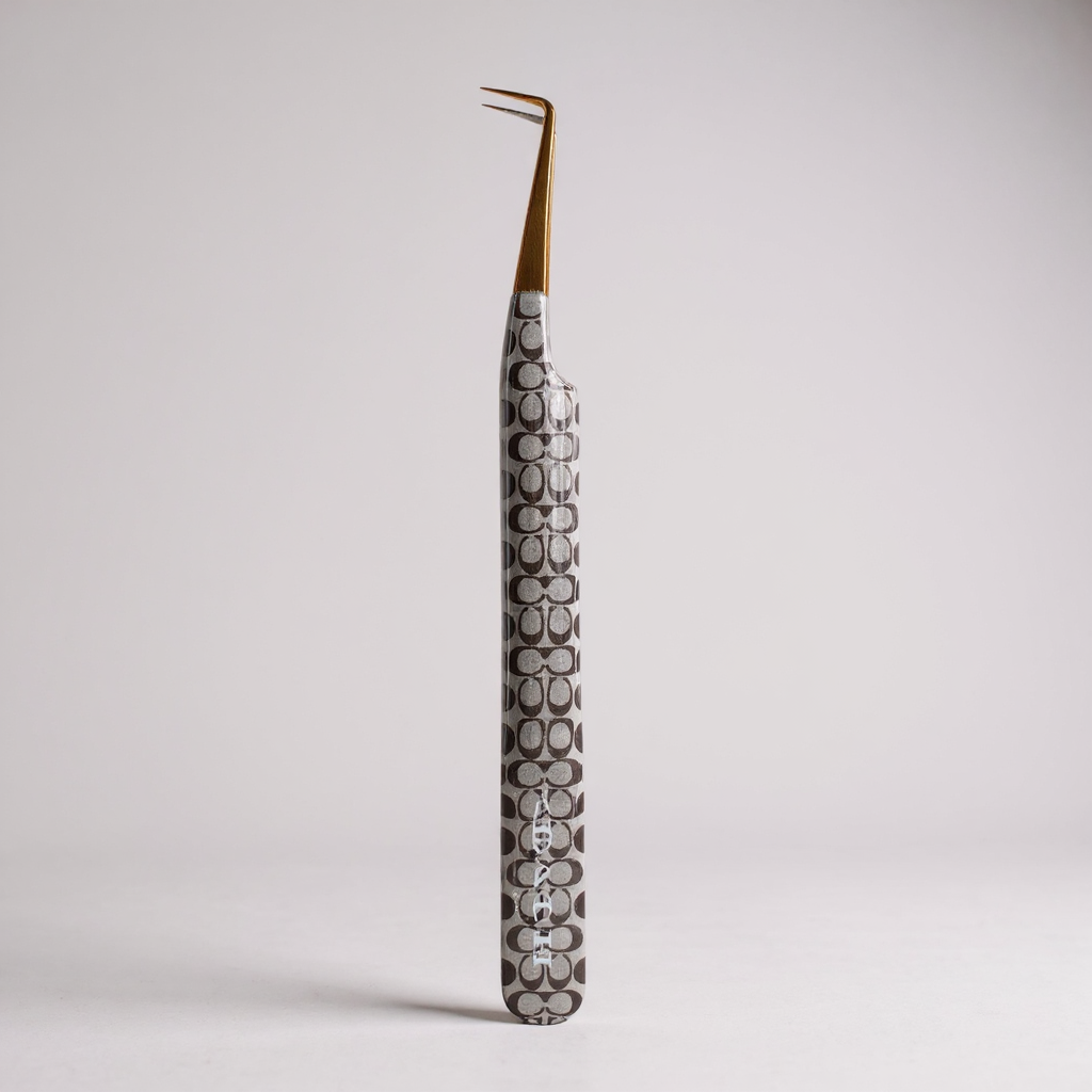Coach Tweezers